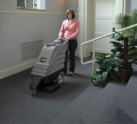 EX-SC-1020P Carpet Extractor cleaning a carpeted room EX-SC-1020P Carpet Extractor cleaning a carpeted room